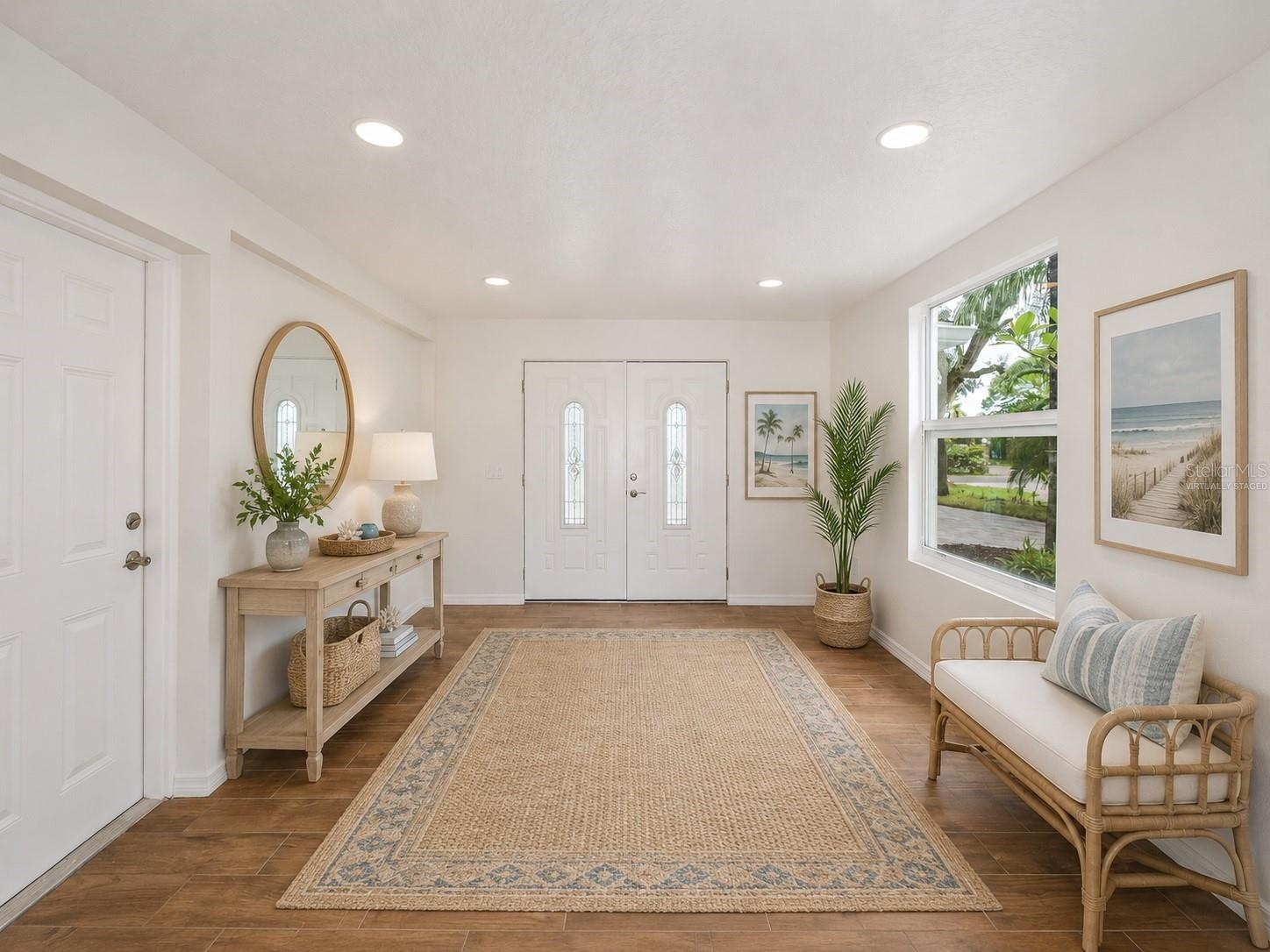 Virtually Staged down stairs foyer