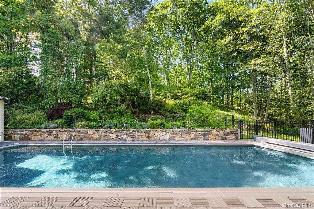 Outdoor pool featuring a patio area