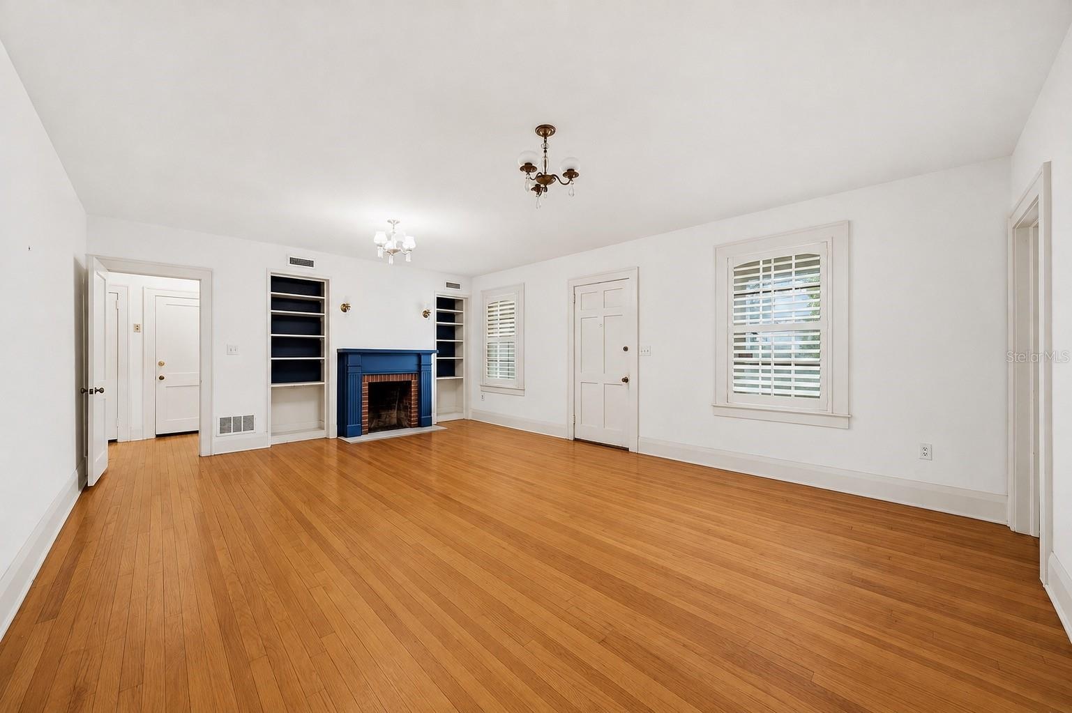 Parlor Room leading to hallway with 4 bedrooms