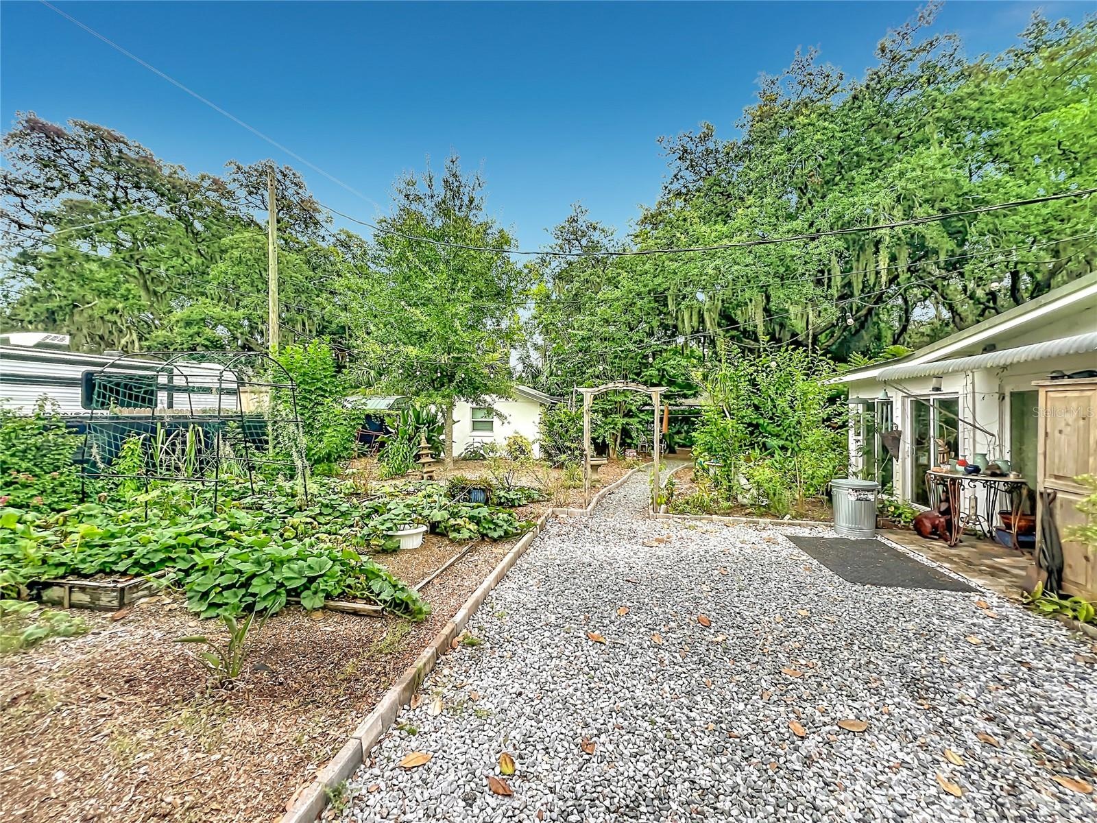 Left side of property leading to studio efficiency apartment