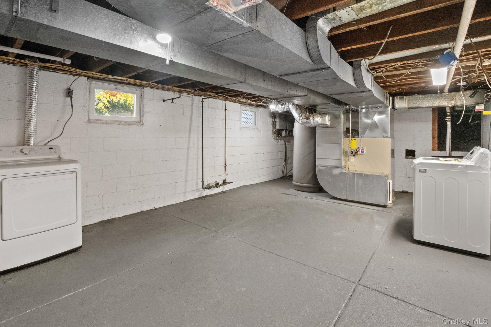 Full clean basement with storage and brand new washer dryer