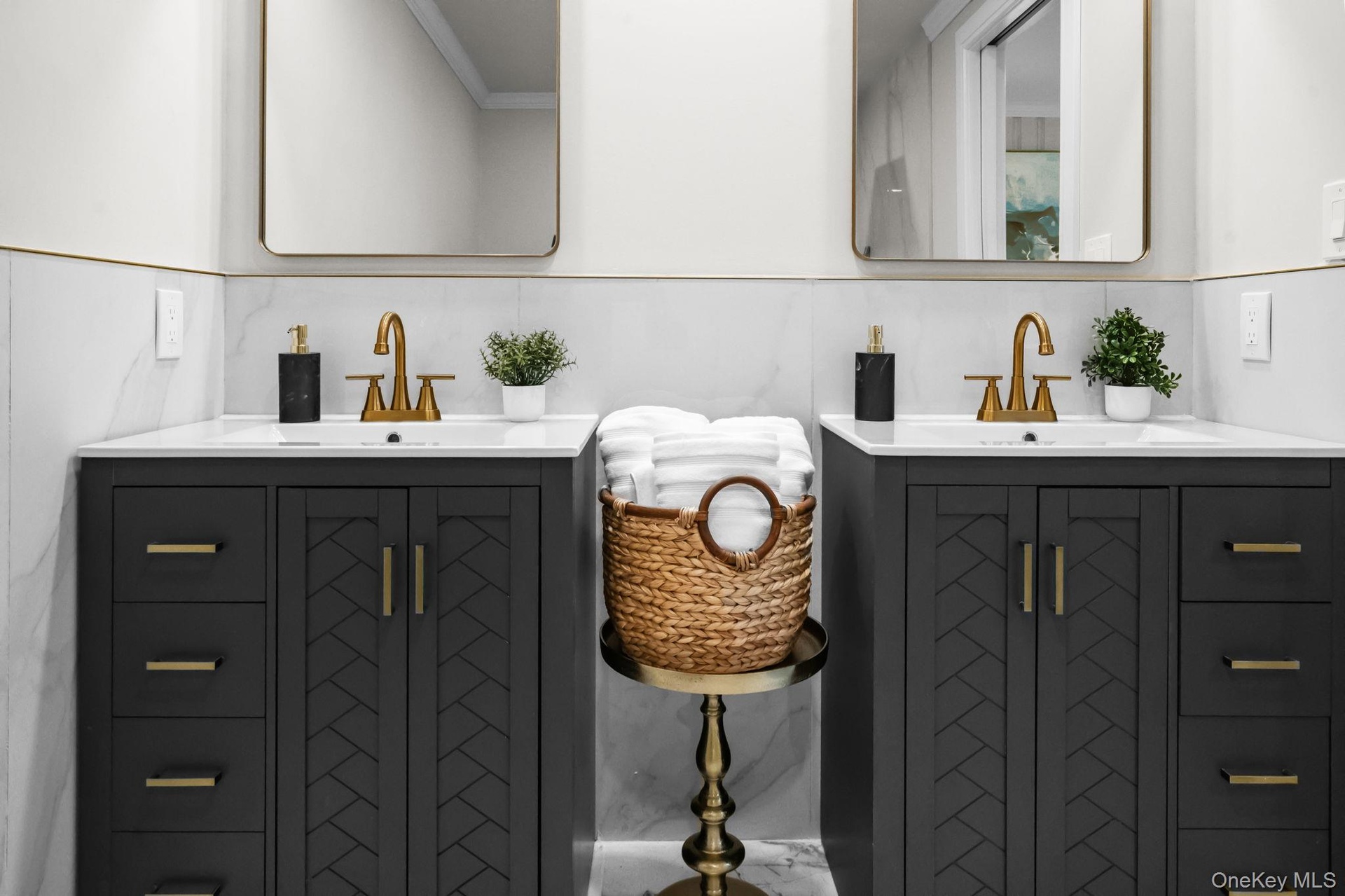 Custom cabinetry and coordinated finishes combine style and functionality in this beautifully renovated ensuite.