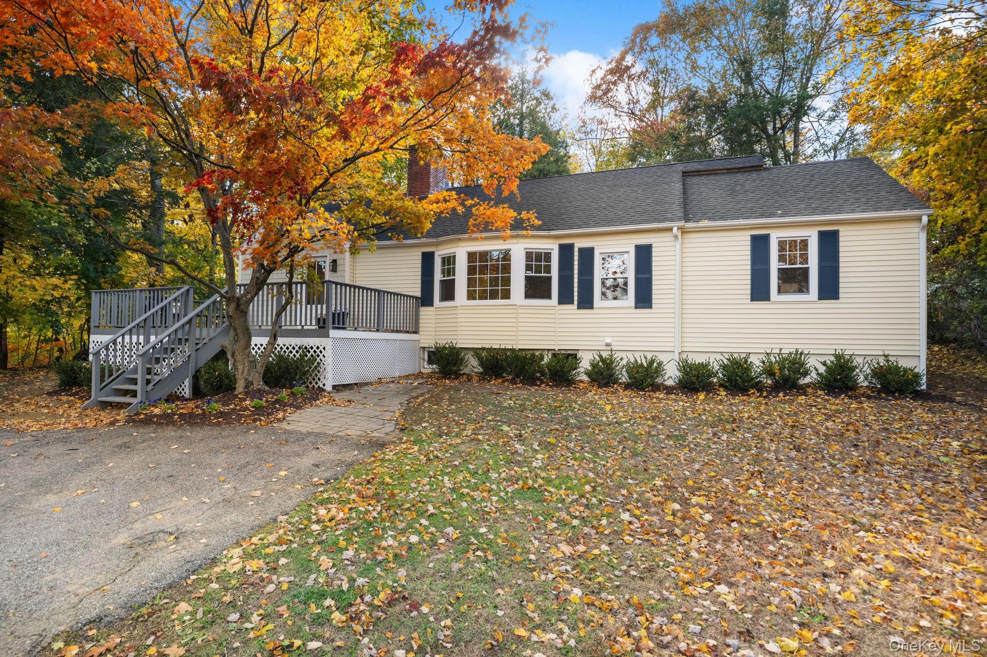 A timeless exterior design complemented by modern updates, creating a welcoming first impression for this move-in ready home.