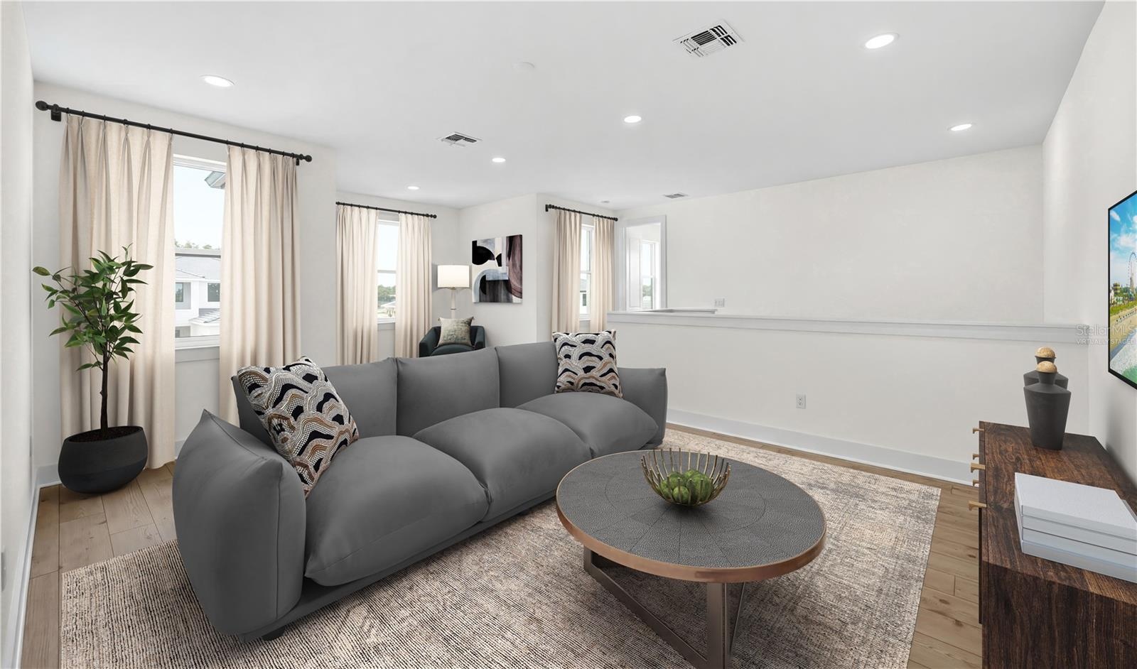 Second floor loft. Virtually staged.