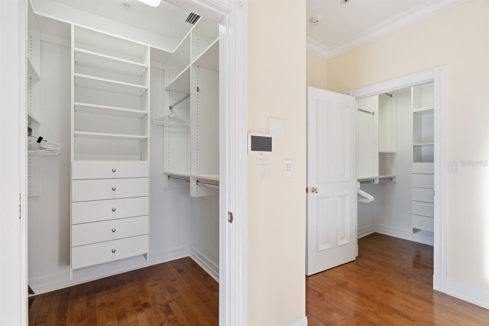 Upstairs primary dual walk-in custom closets