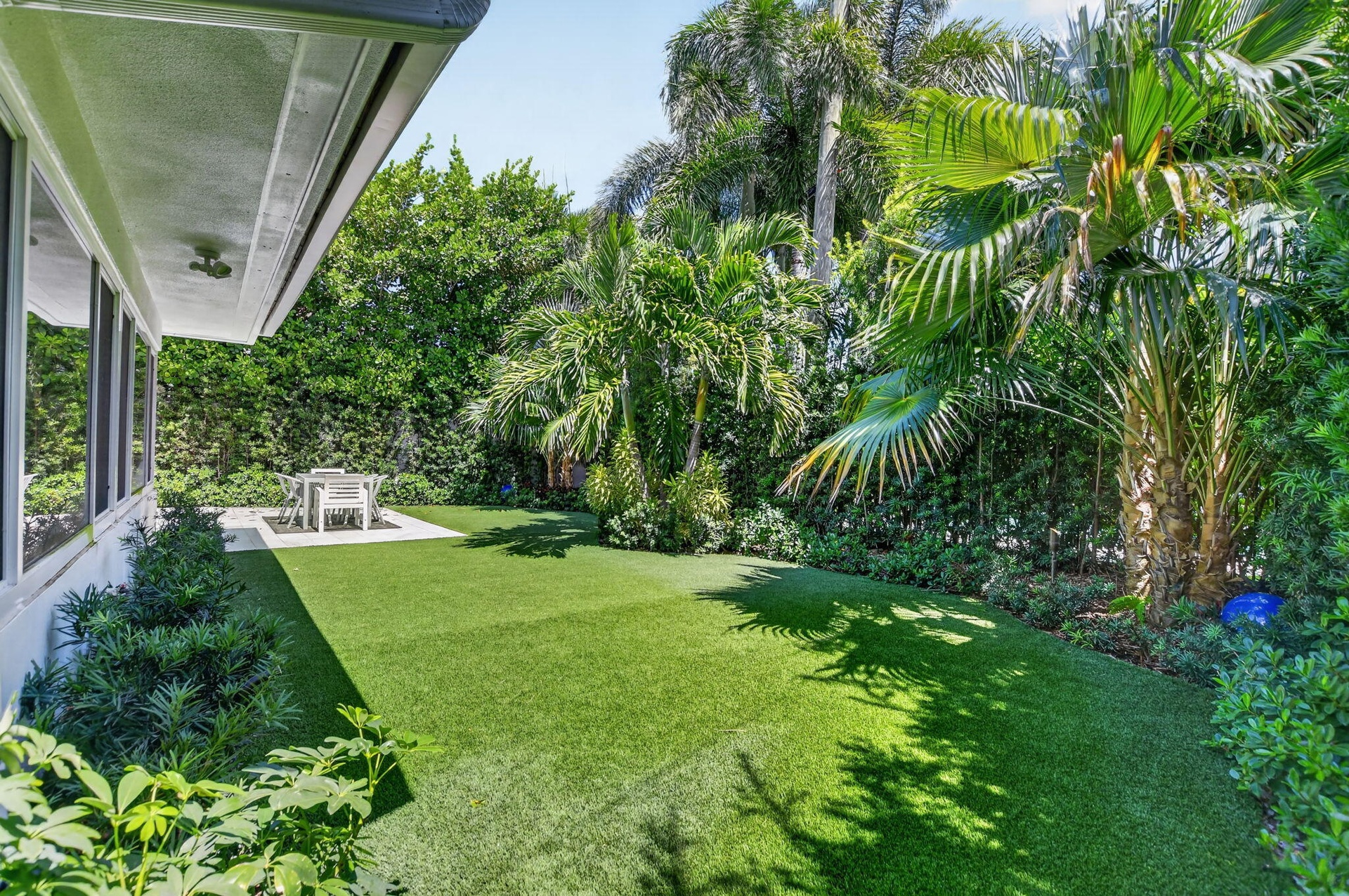 FEEL LIKE YOU ARE AT A RESORT... without leaving home? Just think of all the good times you will have in your very own yard.... and NEVER have to mow 