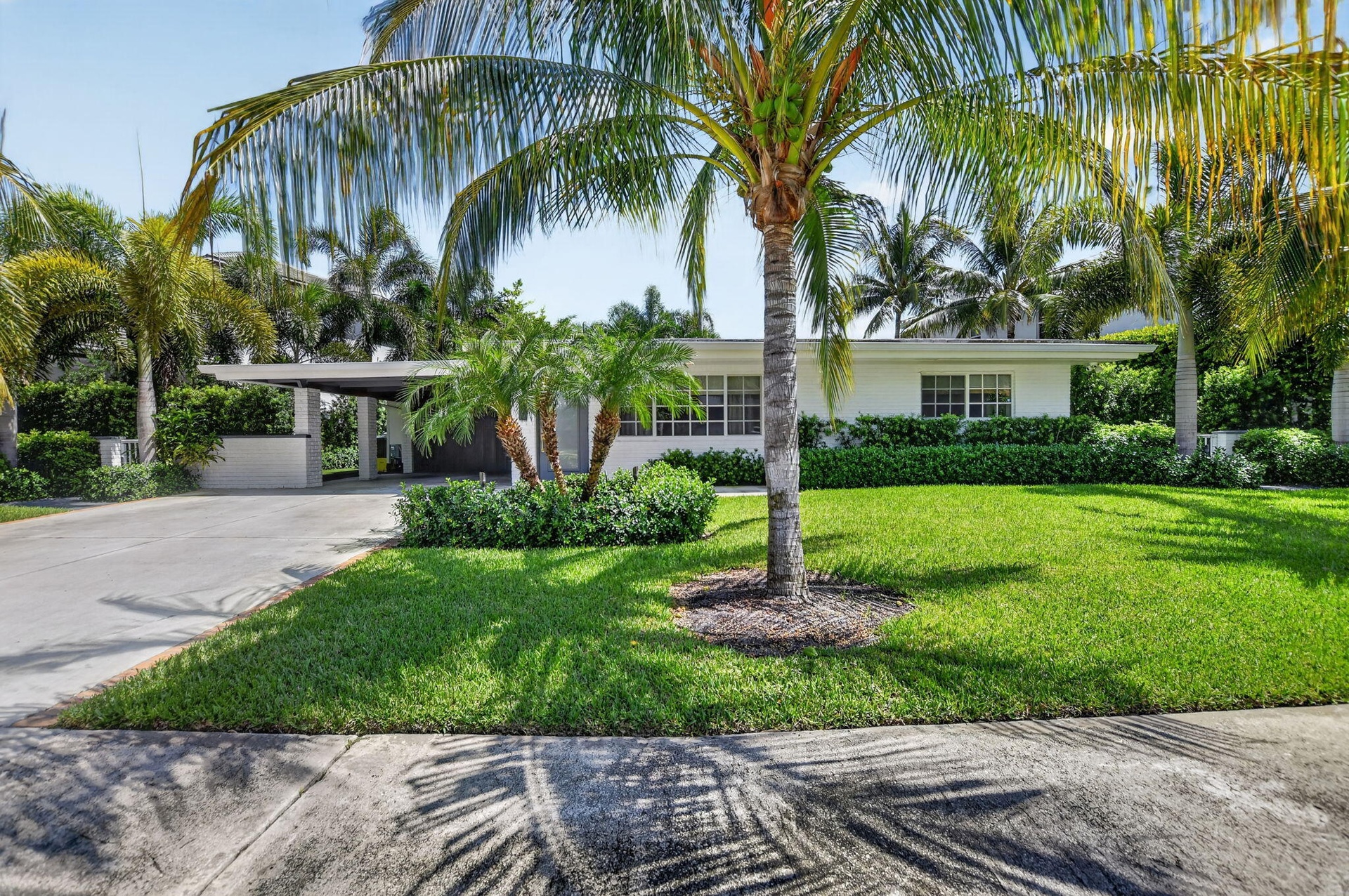 WELCOME HOME to your new East Boca Beautifully updated 3/2 home in Boca's Golden Triangle, just mins to the beach! Front elevation faces South.