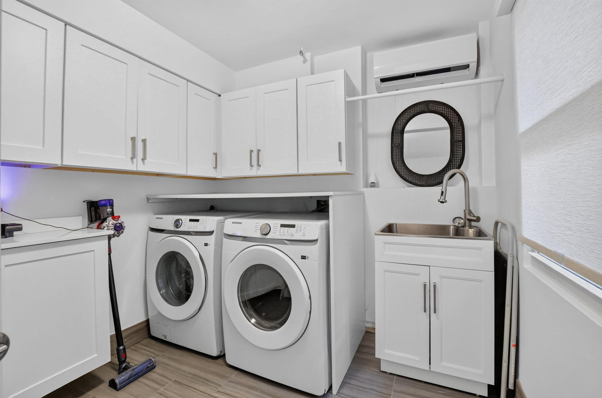 LAUNDRY ROOM: accessible off the family room, the hall to the carport and has an exterior door to the back yard patio... the new window keeps it brigh