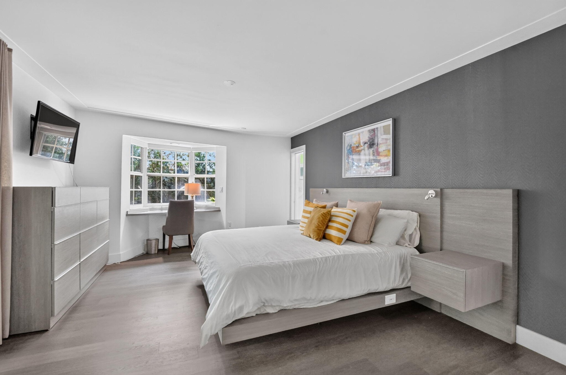 Exceptionally large Private Primary Suite with an inviting east-facing bay window! (The bed in the picture is a king-size bed).