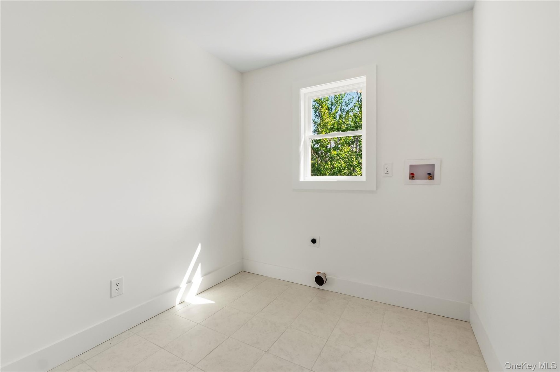 Laundry room located by the bedrooms
