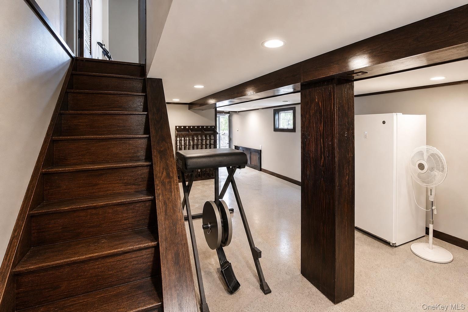 Staircase with wood-finish treads and risers