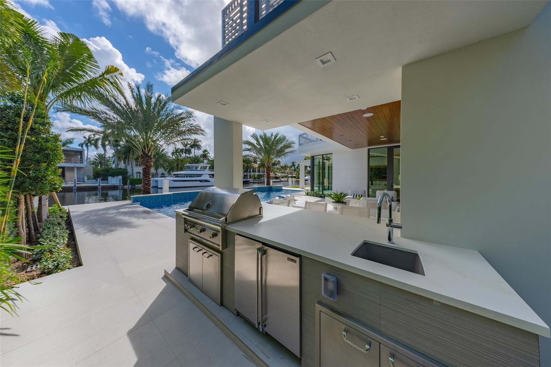 The back patio features a fully equipped BBQ area, perfect for outdoor entertaining and al fresco dining.