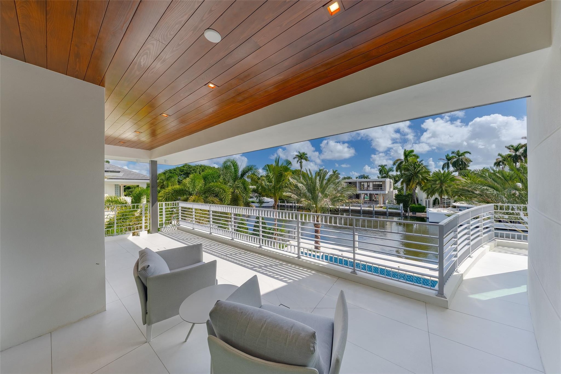 The second floor features a private patio in front of the master bedroom