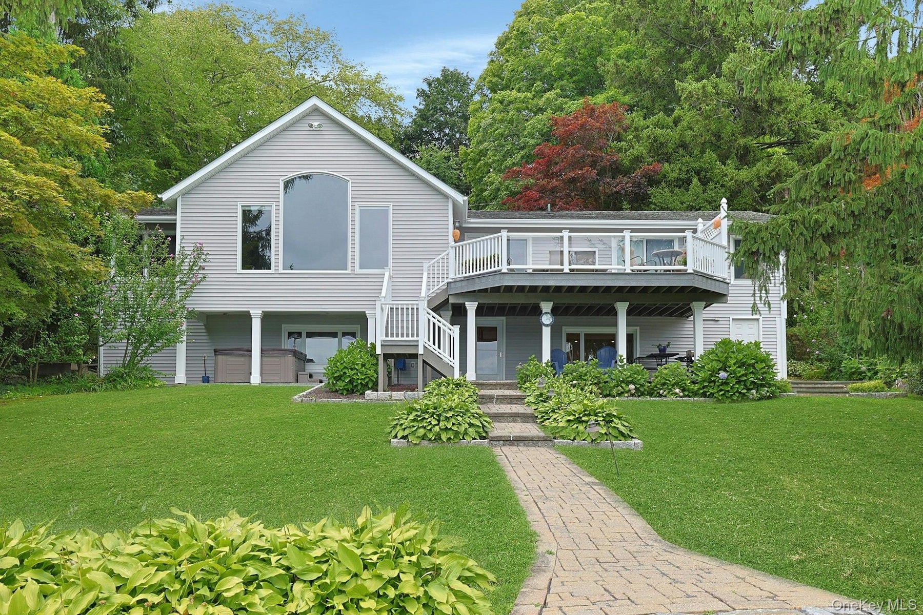 Multiple levels of outdoor living provide the perfect places to relax, entertain, and take in the breathtaking lake views from every angle.