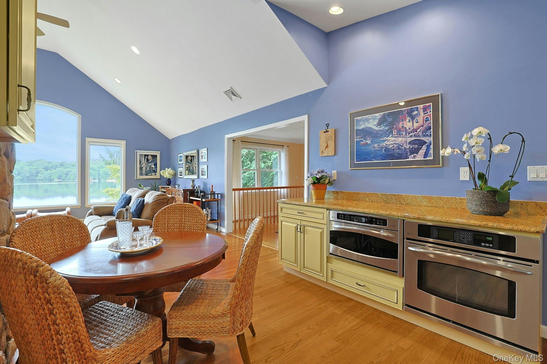 Enjoy every meal with a view. The eat-in kitchen table overlooks the lake, bringing peaceful ripples of light and magic to your everyday meals.