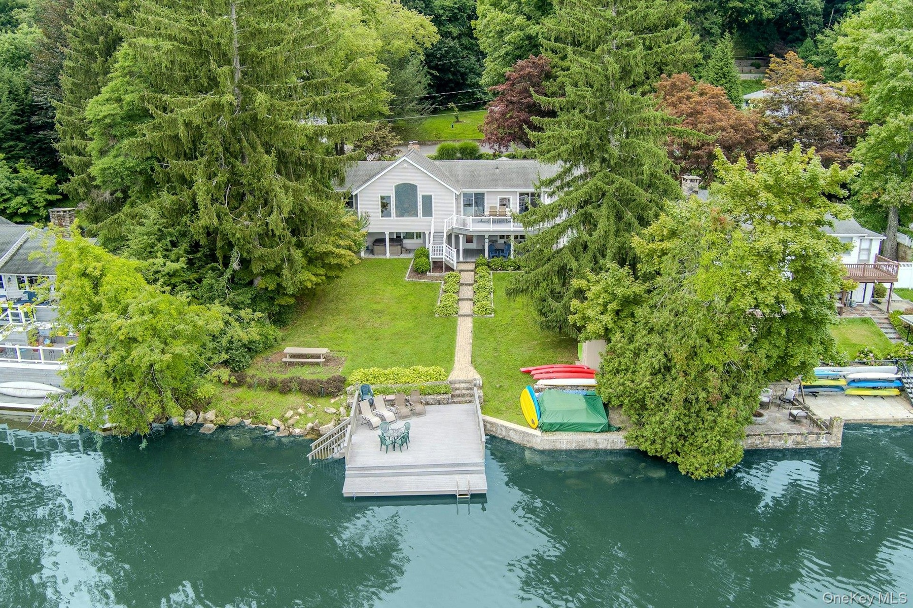 Live on vacation every day! This dream lake house has it all, only an hour from NYC! Who needs the Hamptons, when you can have the lake life of your d