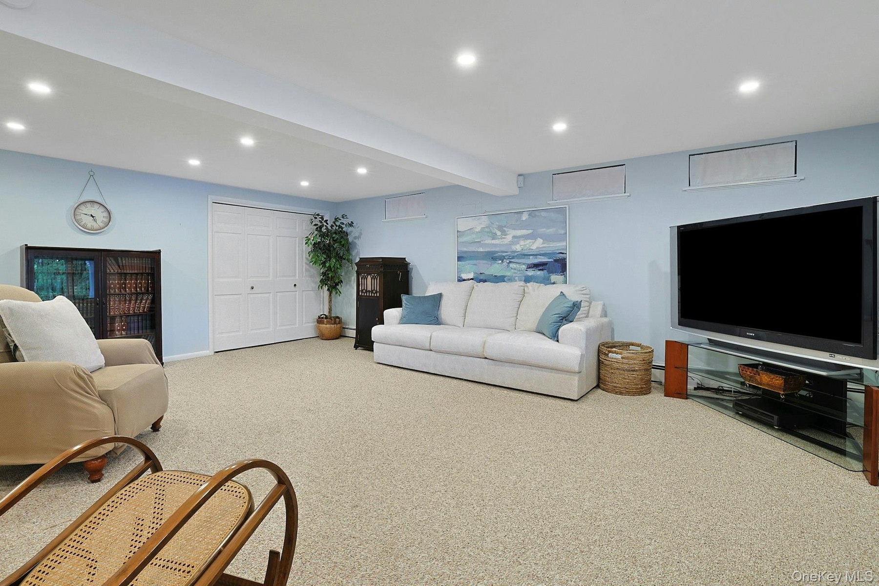 Huge, with multiple closets and several windows - so much space for all your fun and entertaining. Or just quiet time at home.