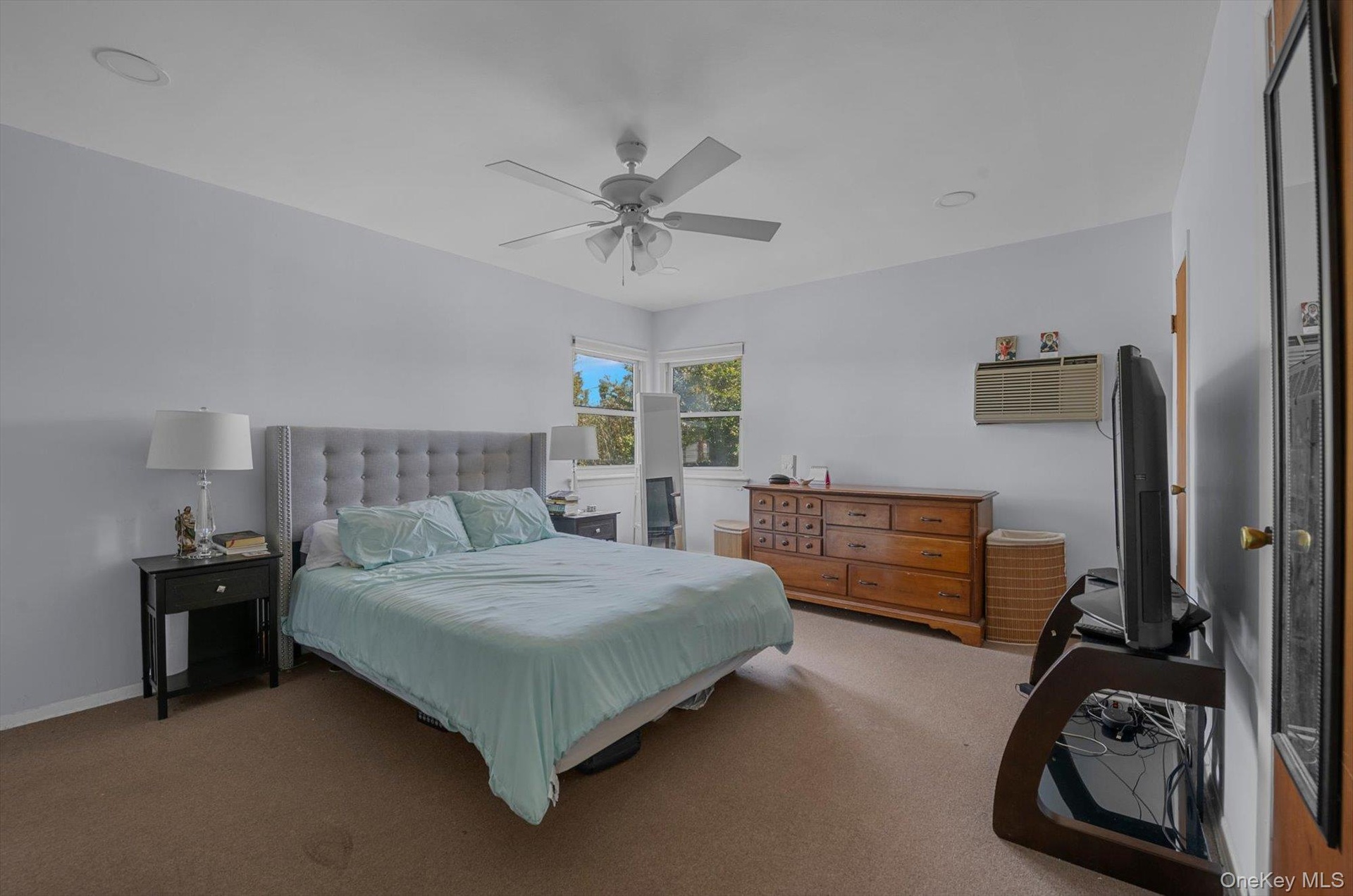 Primary bedroom with half bath