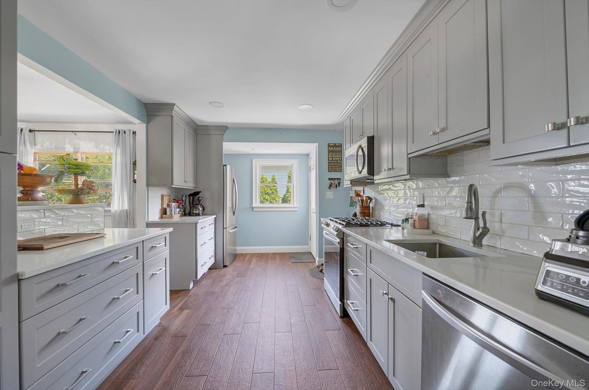 Updated kitchen with outdoor exit to backyard