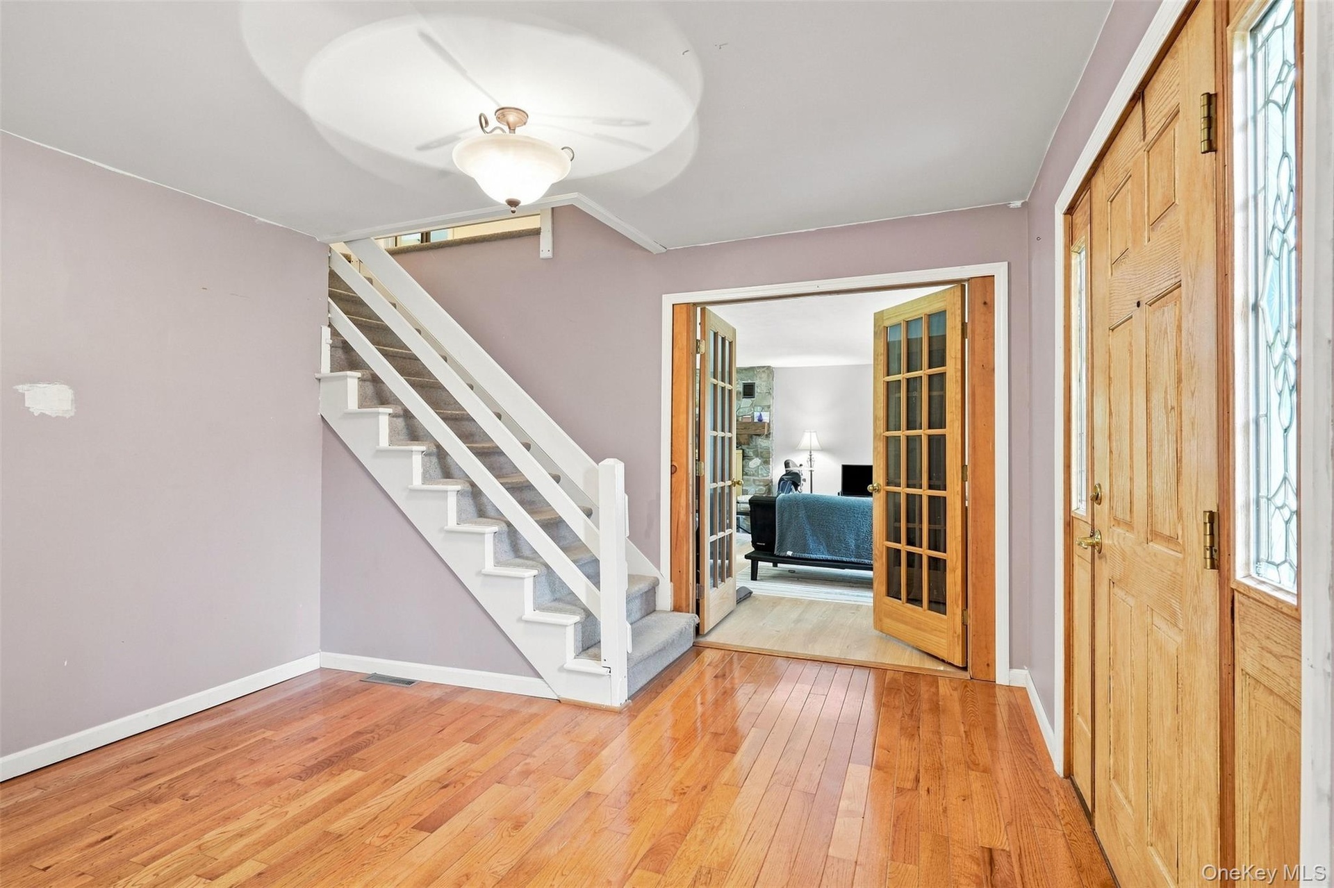 Gleaming hardwood floors greet you in the foyer and continue into dining room