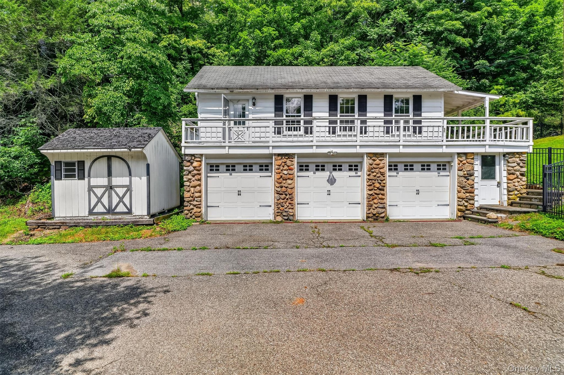 Stone Pillared Columns and wrap around porch