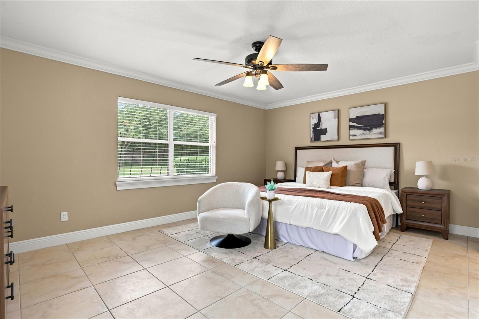 The spacious Primary Suite offers a peaceful escape with a generous walk-in closet and a beautifully appointed EN SUITE BATH.