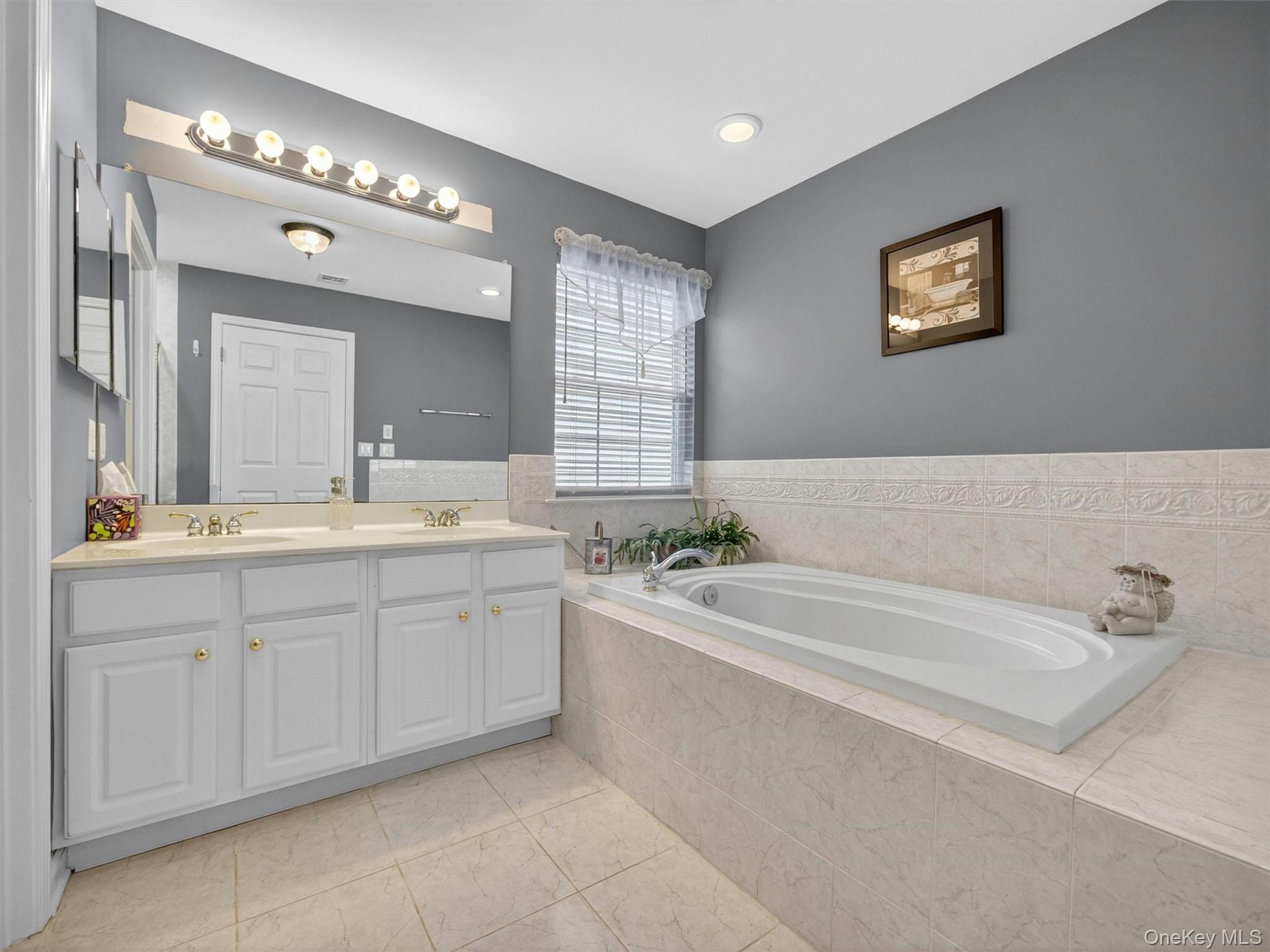Soaking tub, double vanity.