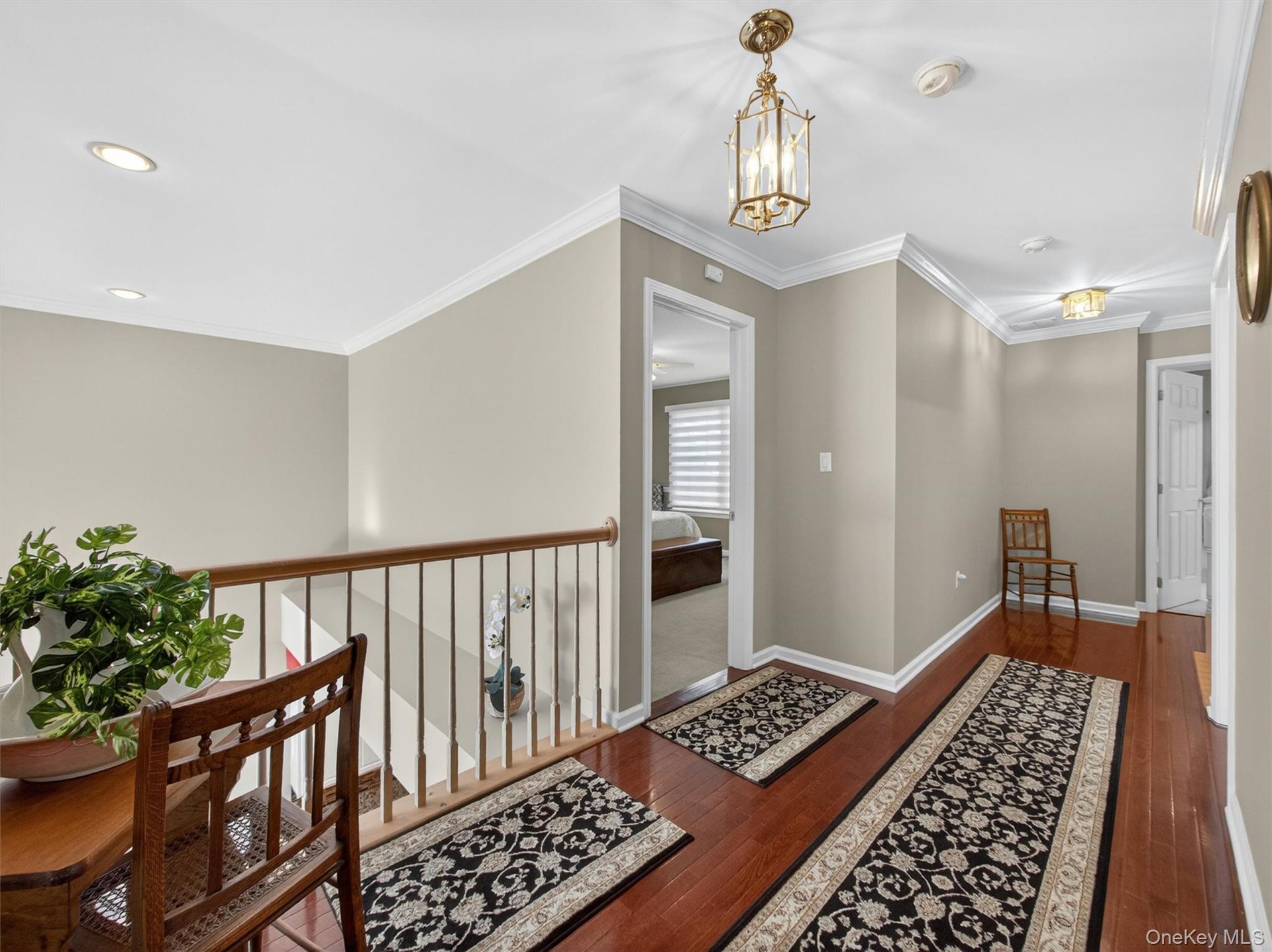 Bedroom level with overlook down to the dining room and kitchen.
