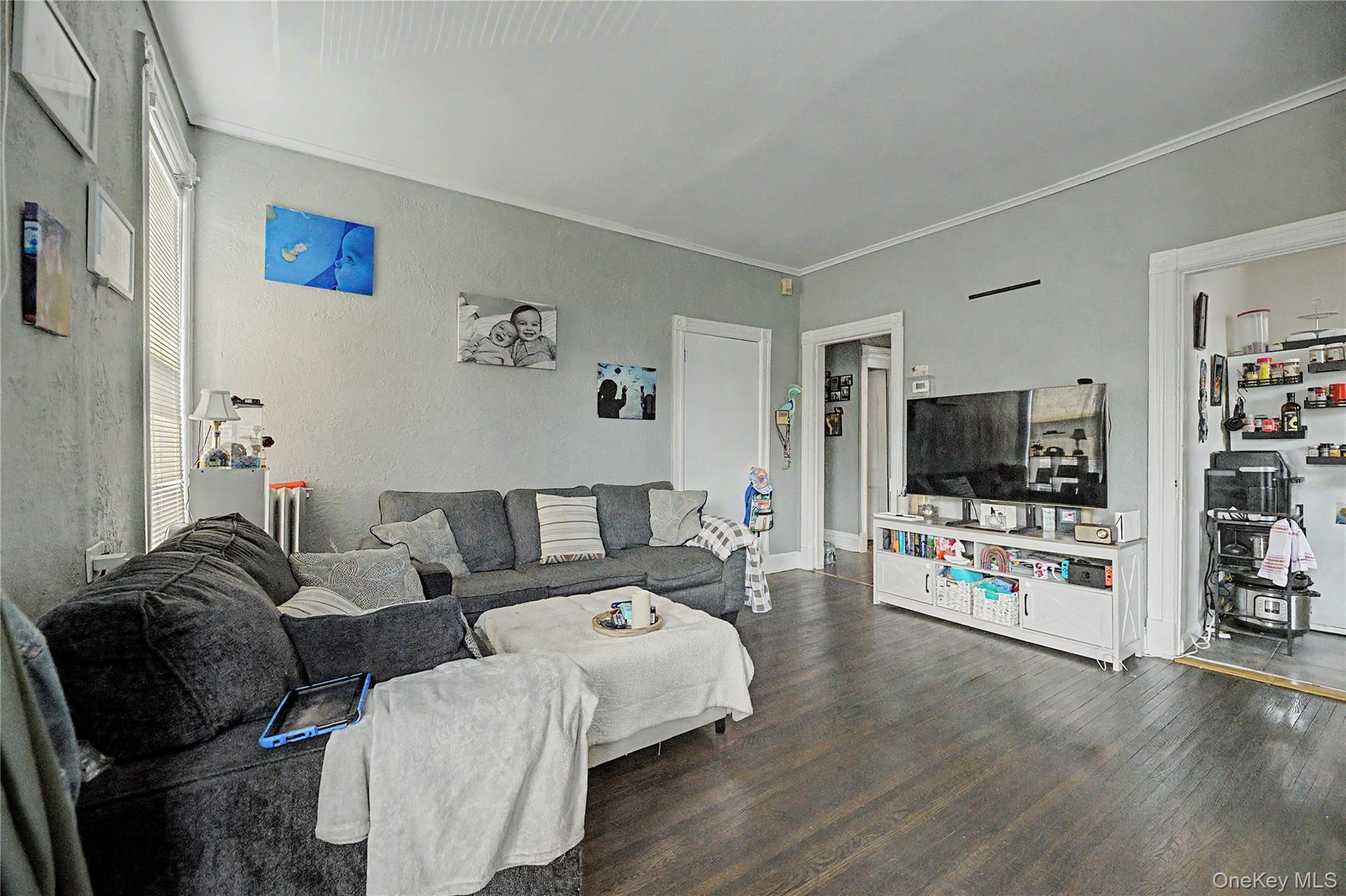 Wood-finish flooring throughout the space