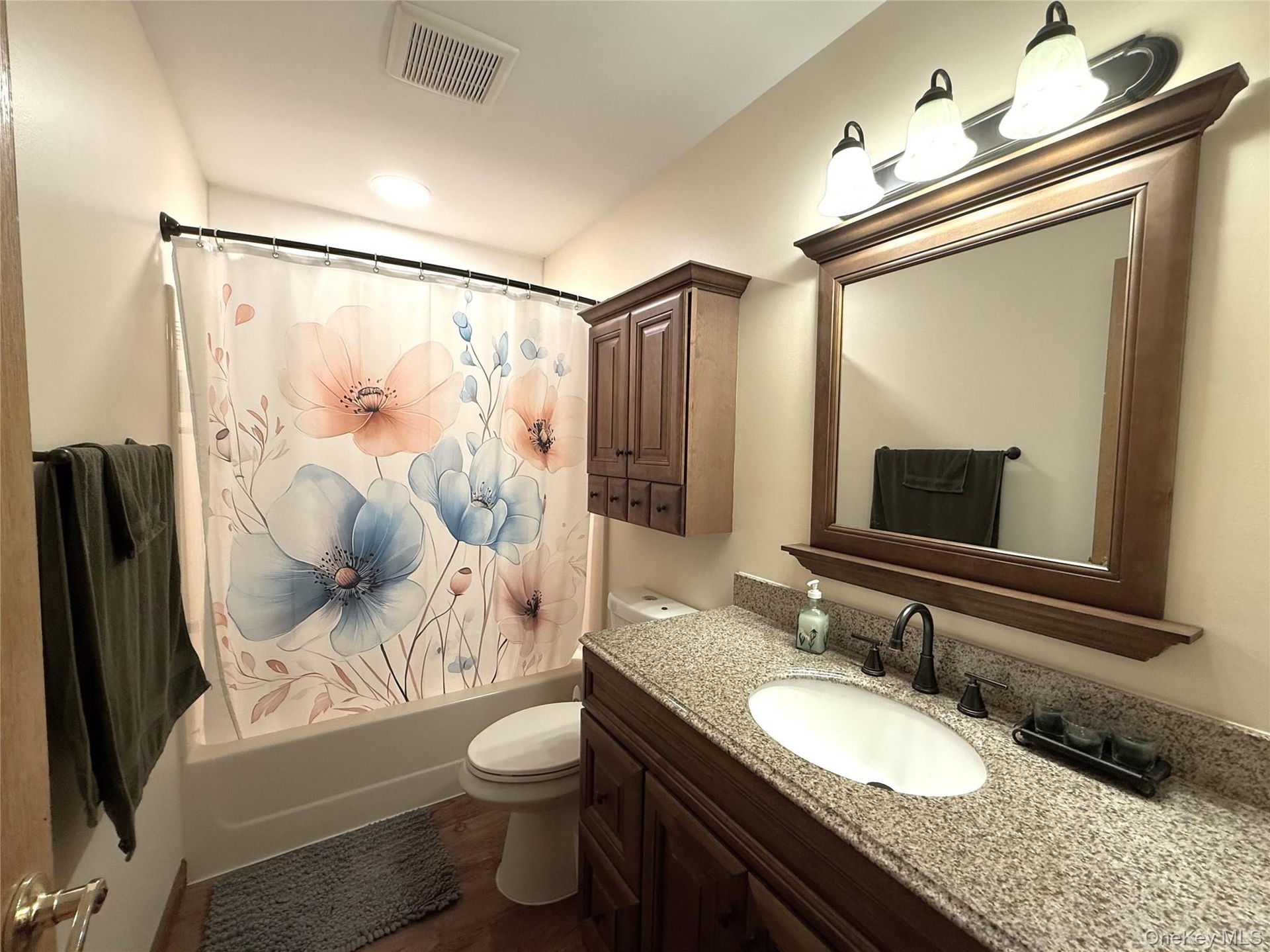 2nd floor full bath. Vanity with granite top.