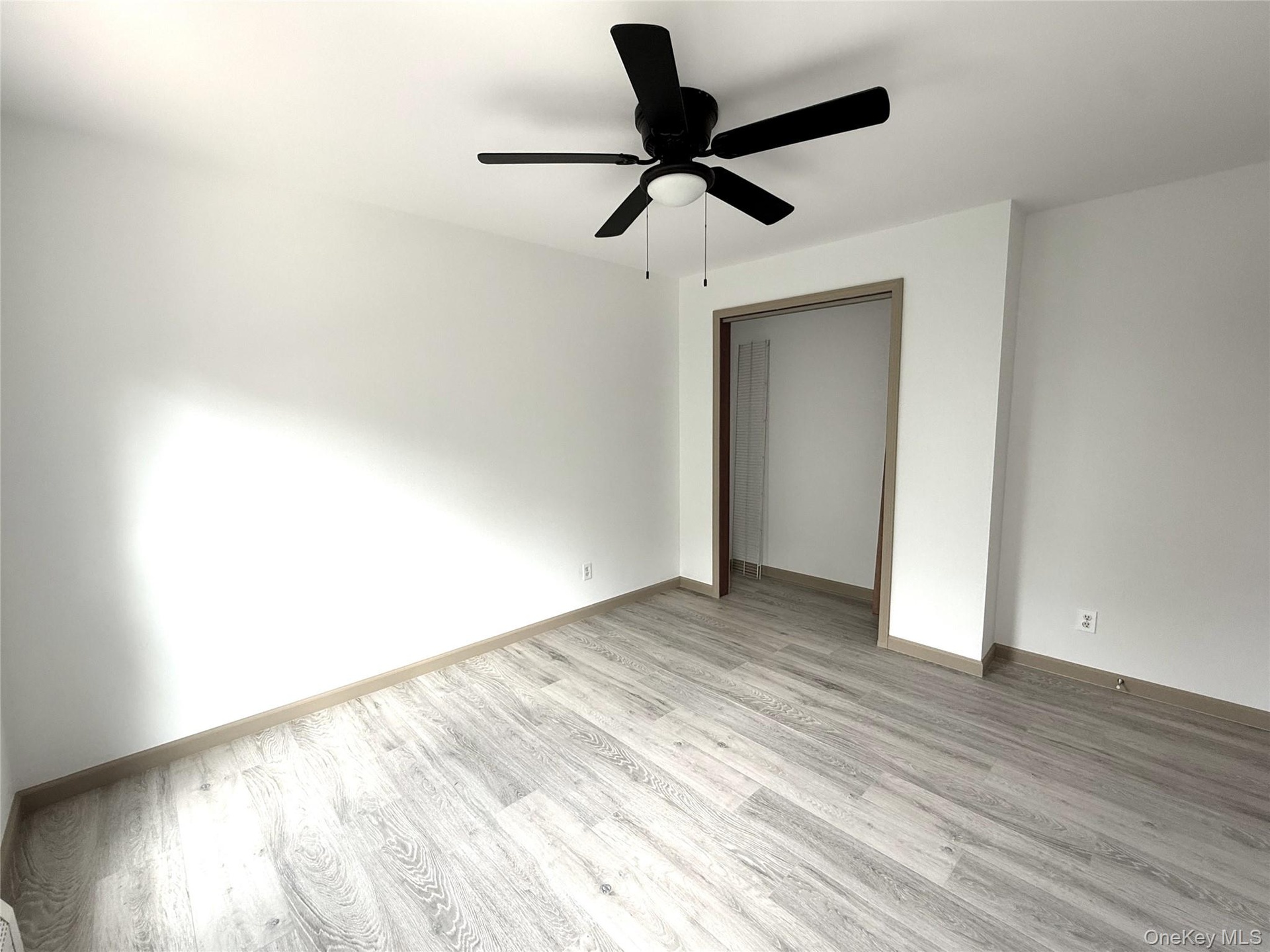 BR 2. Freshly painted. Love the new floor! New ceiling fan as well.