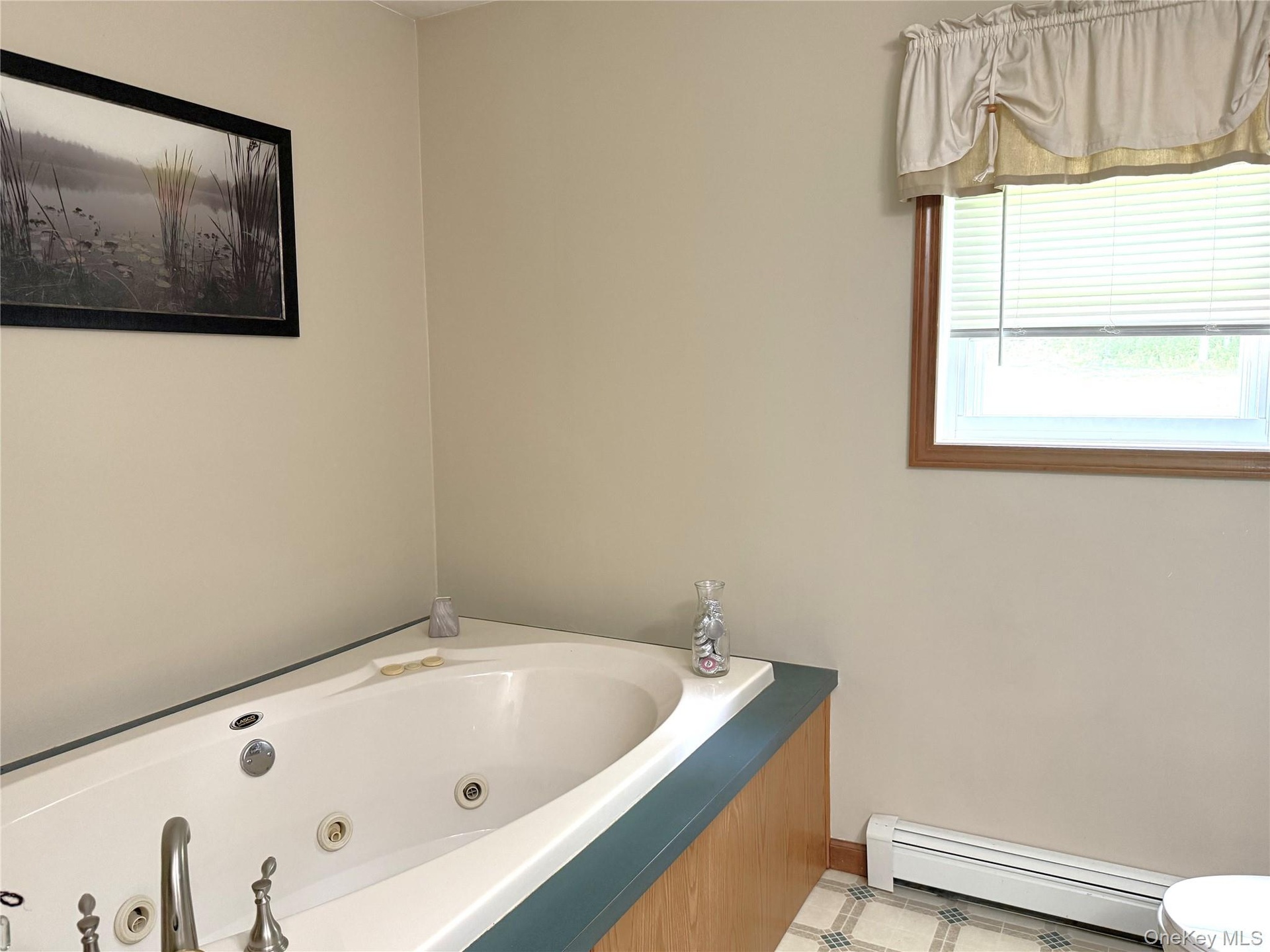Spacious ensuite also offers a shower.