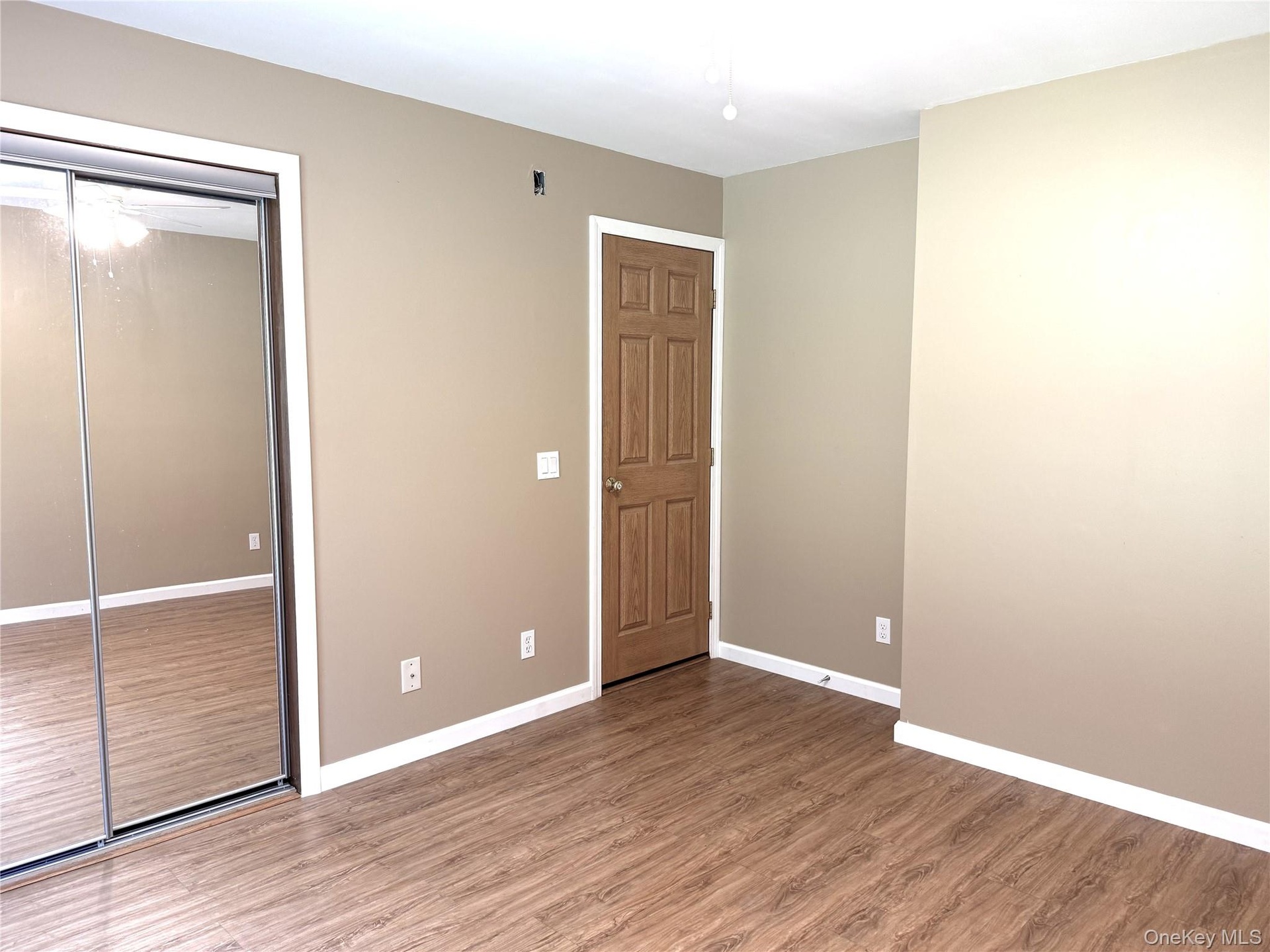 BR 3. Good-size mirrored door closet.