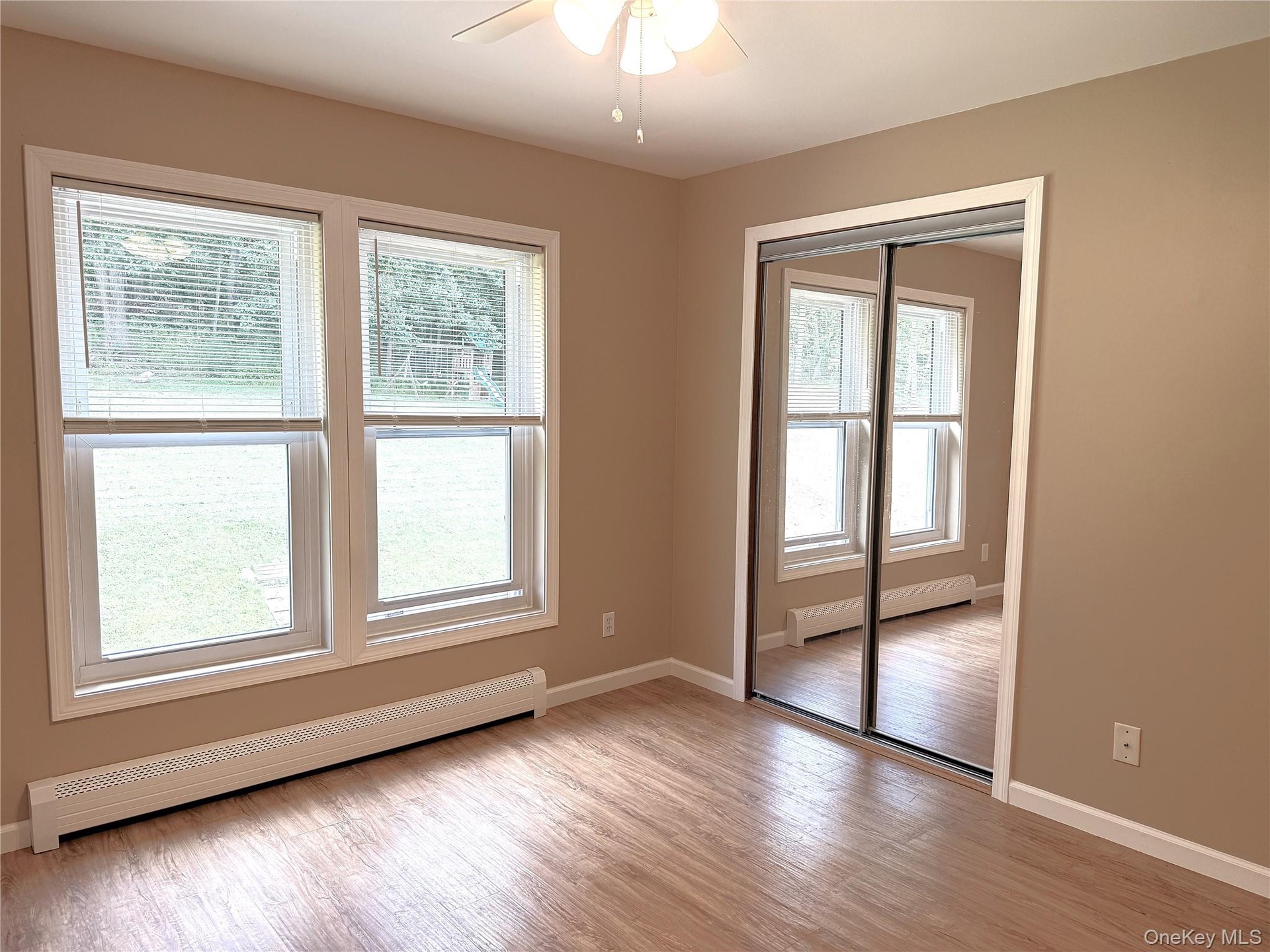 BR 3. View of pretty back yard. Ceiling fan as well. Freshly painted.