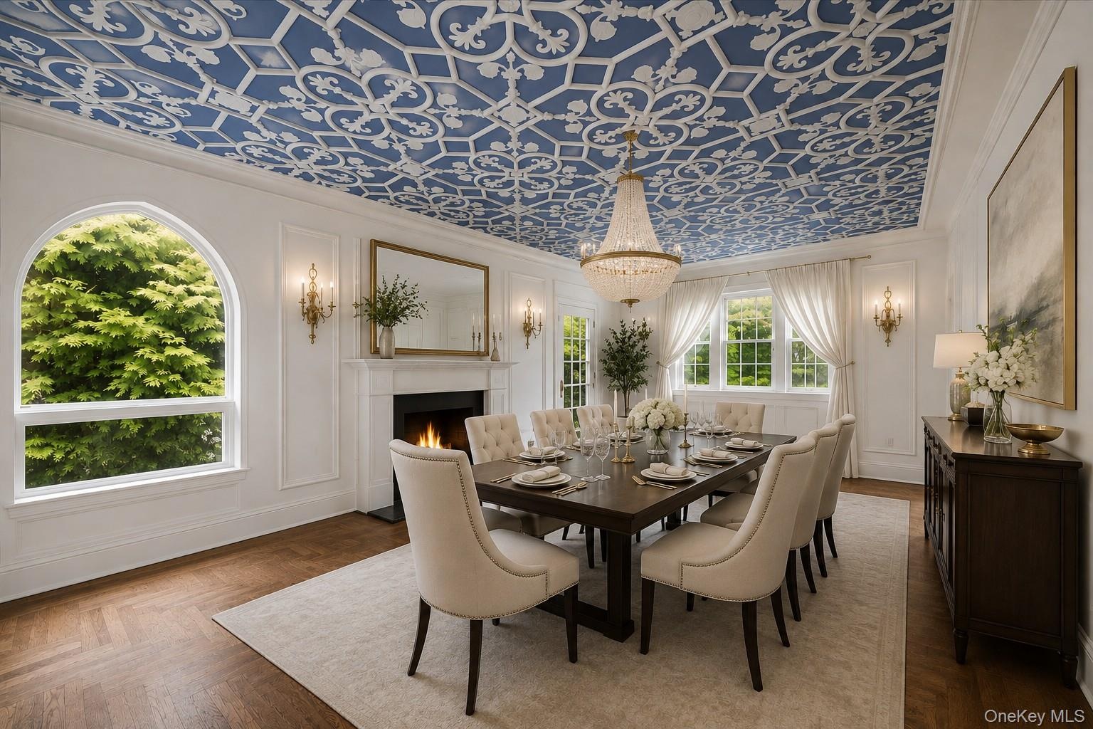 Elegant dining room with an ornamental plasterwork ceiling with another cozy fire place