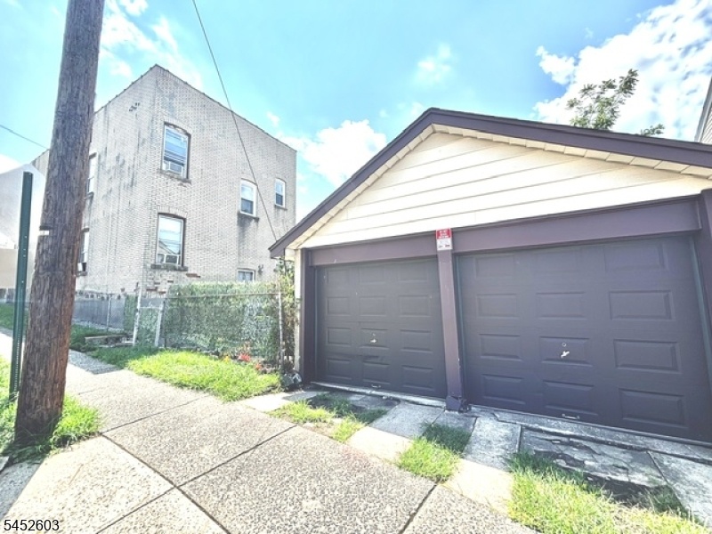 Side of house and garages