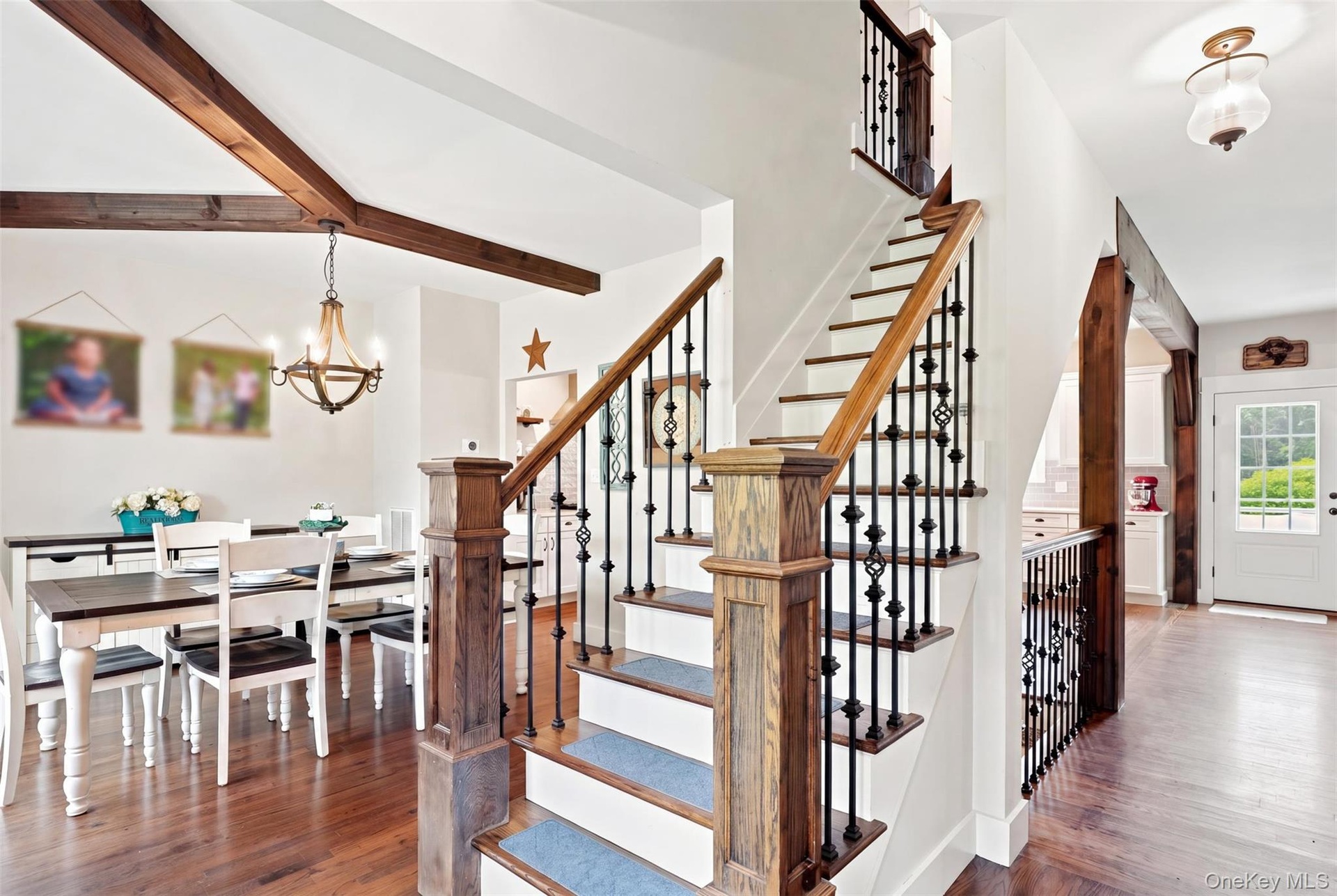 Open concept living with great flow from one living space to another. Rich hardwood floors and neutral walls.