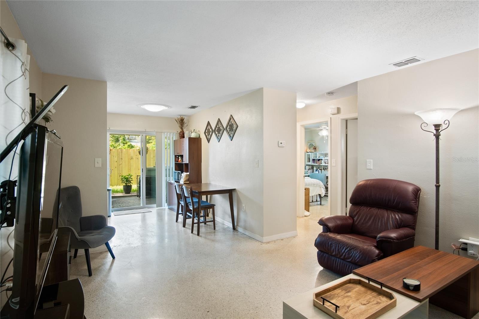 The living and dining area of the back unit.