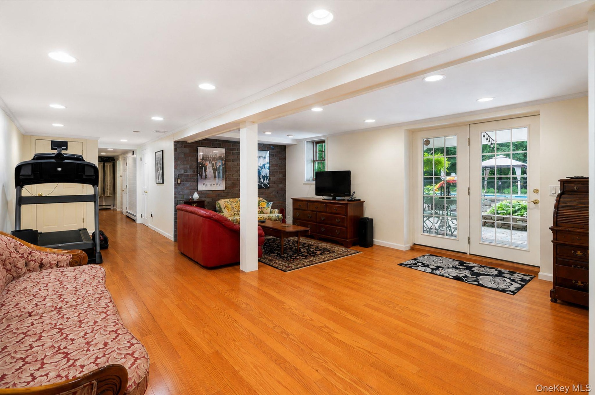 Finished basement with French Doors to Patio