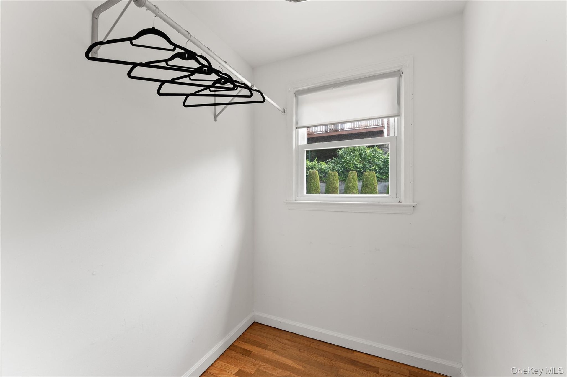 Walk-in closet of Bedroom 3 on the third level.