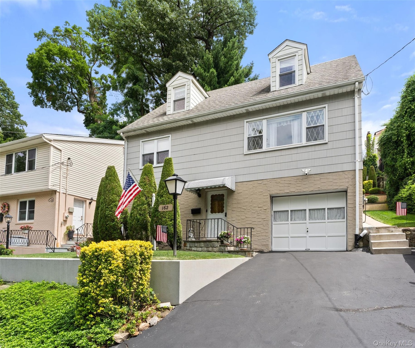 View of the front exterior of 162 Midland Avenue,