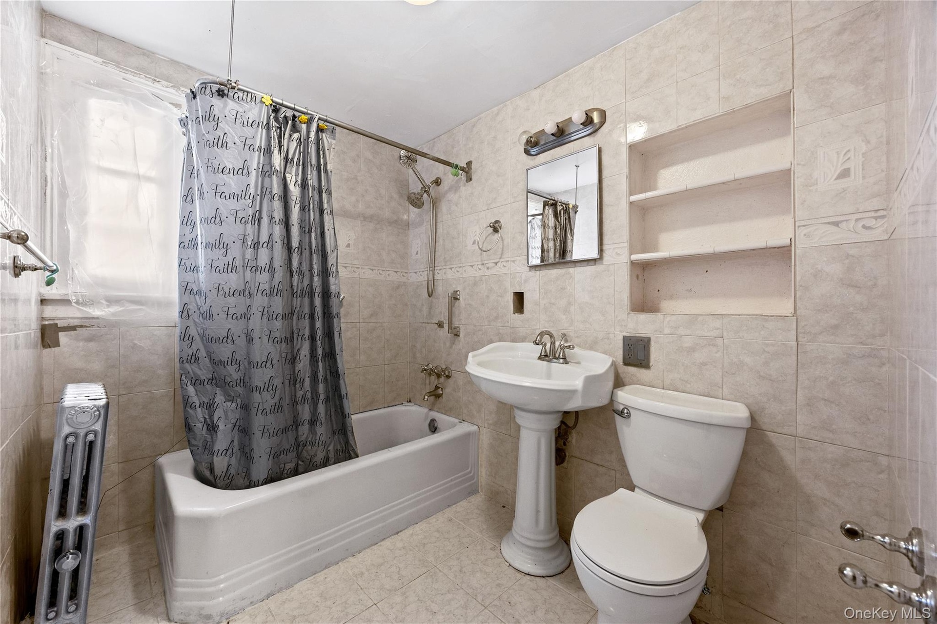 Primary bedroom en-suite bathroom.