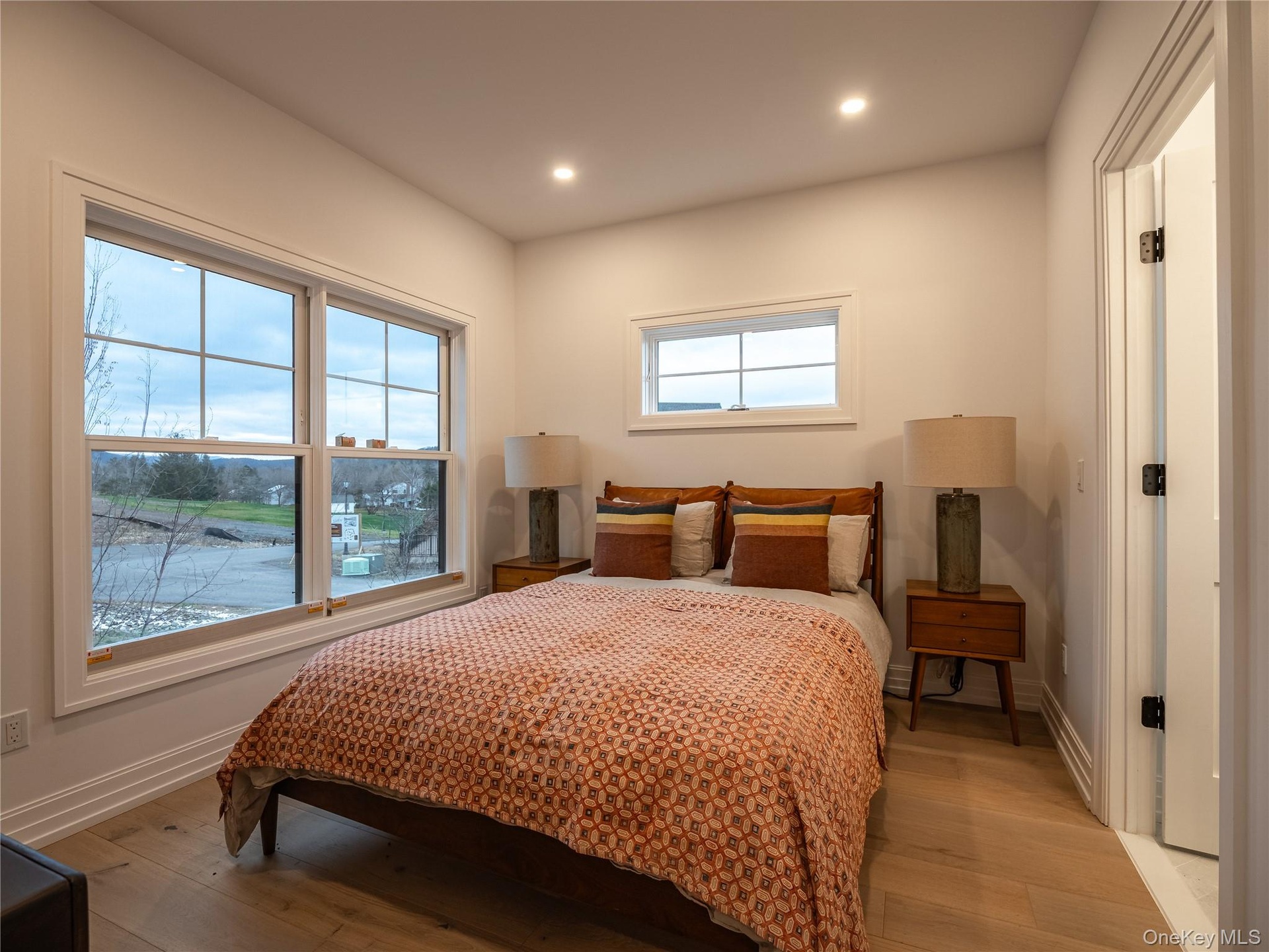 Bedroom featuring wood-type flooring and recessed lighting