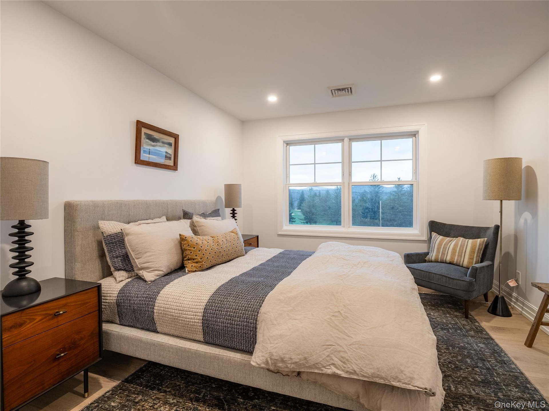 Bedroom featuring recessed lighting and light wood finished floors