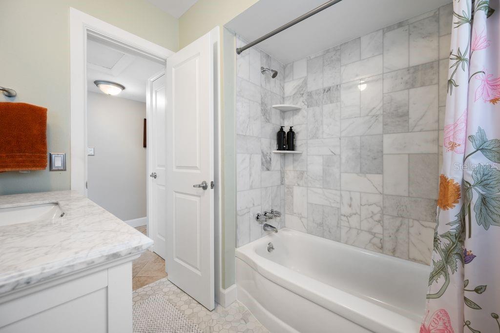 Renovated Hall Bath with Tub Shower