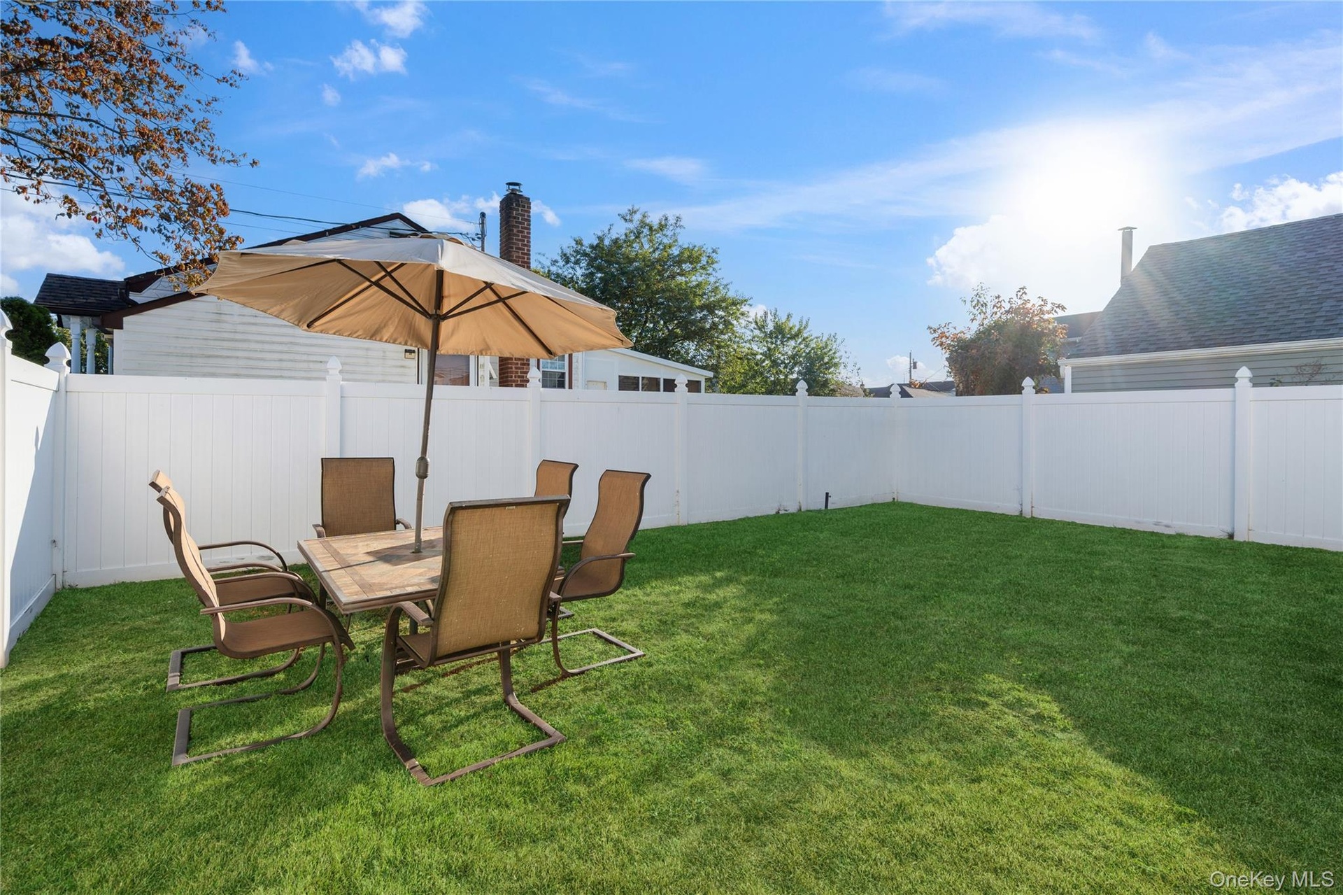 View of fenced backyard