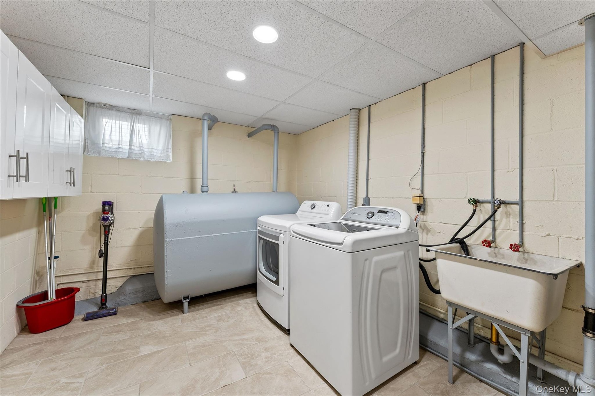 Main level storage, utilities and laundry.