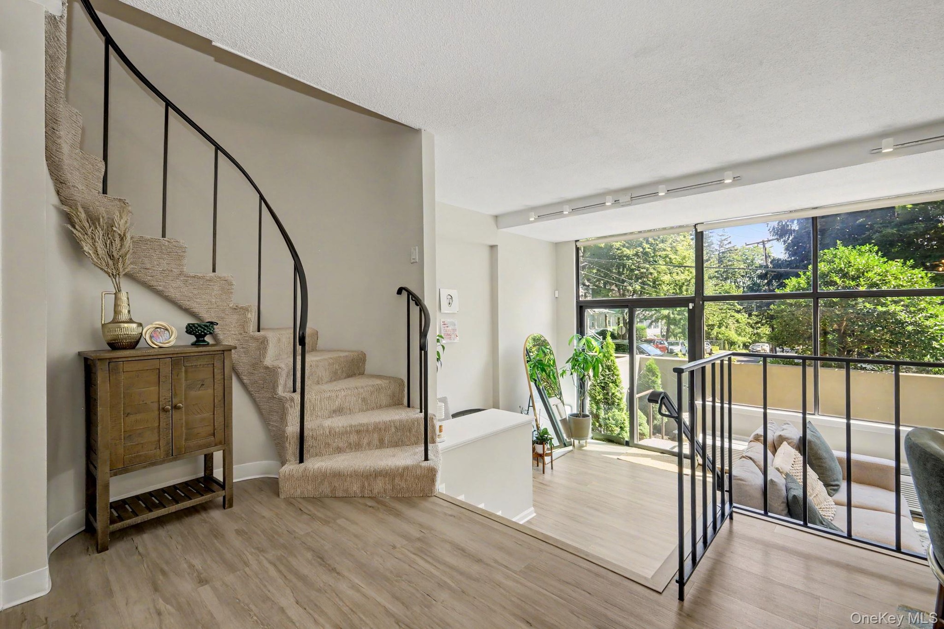 The open-concept first-floor layout offers an effortless flow for both relaxed everyday living and entertaining, while the bedrooms are privately posi