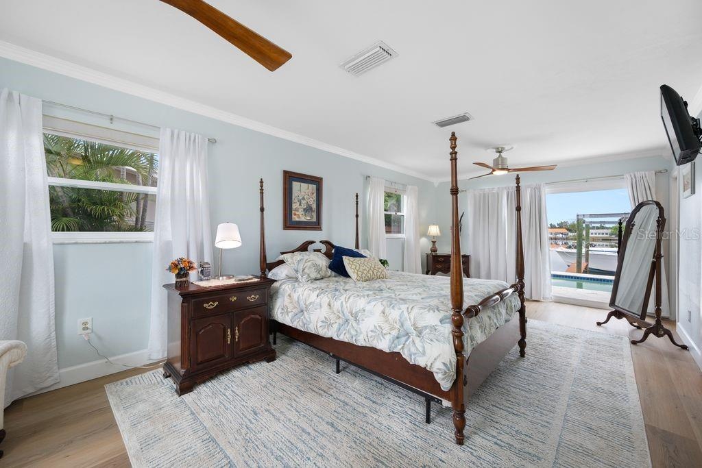 Primary Suite - Slider Leads to Pool and Dock