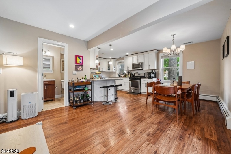 Dining area leading to kitchen